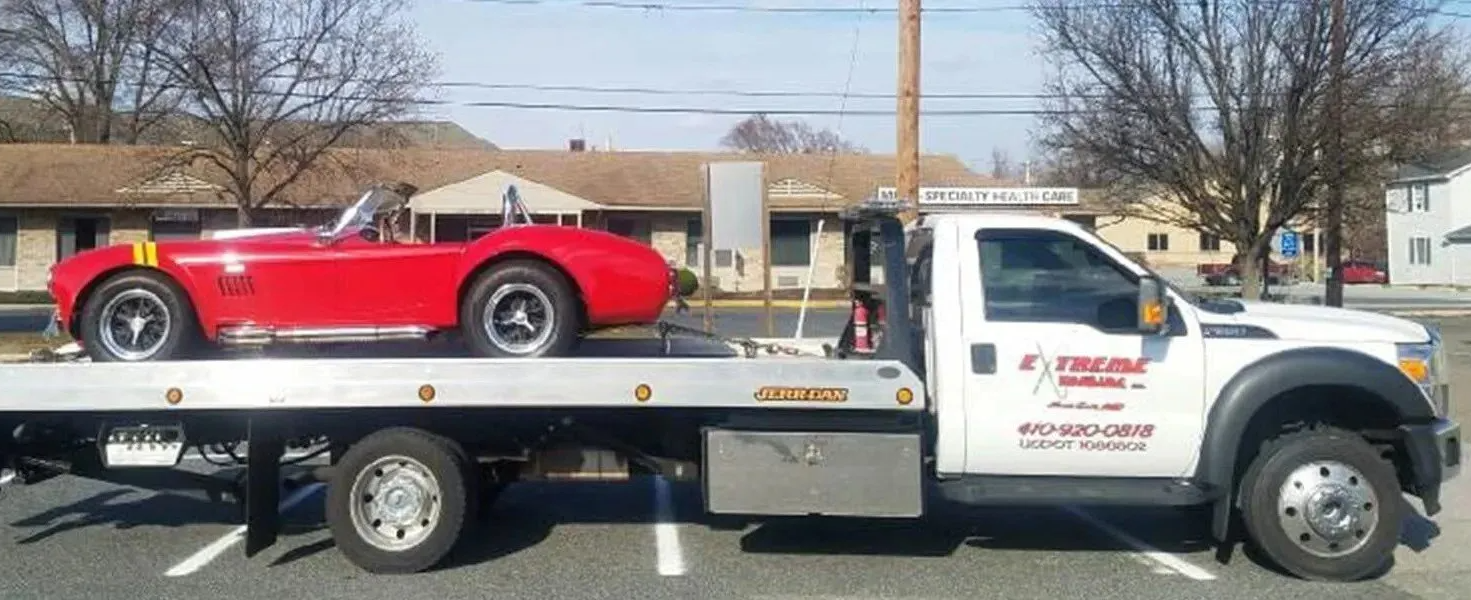 Towing Red Car | Elkton, MD | Extreme Towing LLC