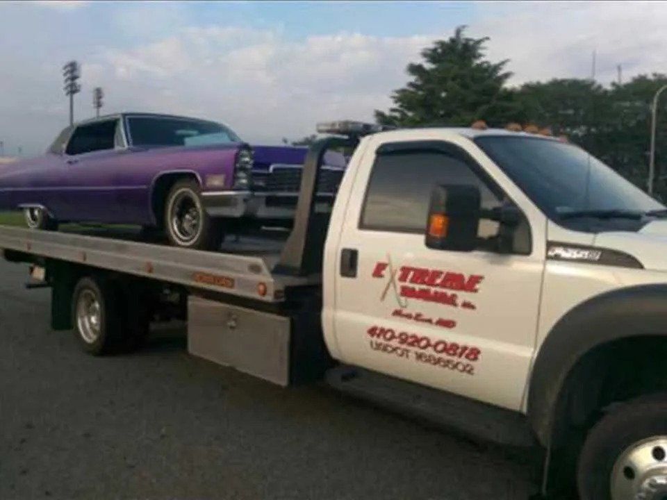 Purple Car on Towing Truck | Elkton, MD | Extreme Towing LLC