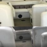 The inside of a boat with white seats and a gray floor.