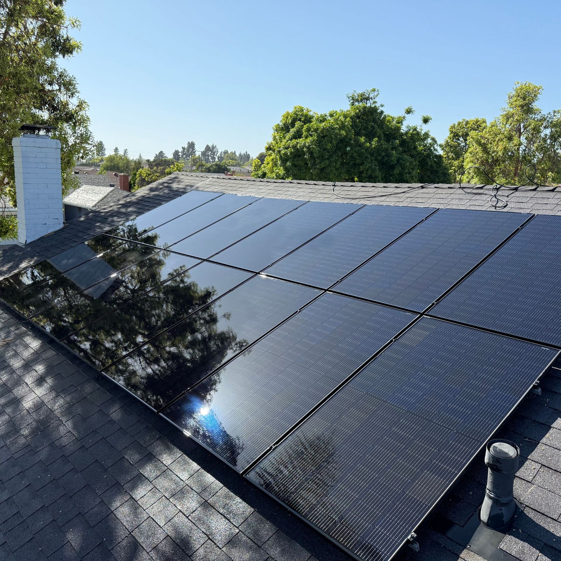 NFG Solar Panel Cleaning Company - A roof with a lot of solar panels on it