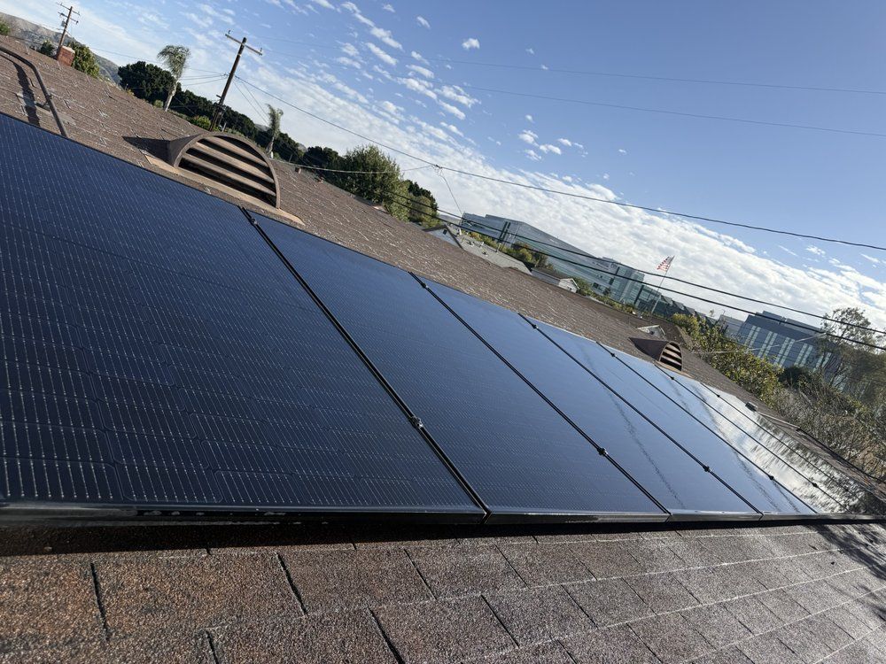 NFG Solar Panel Cleaning Company - A roof with a lot of solar panels on it