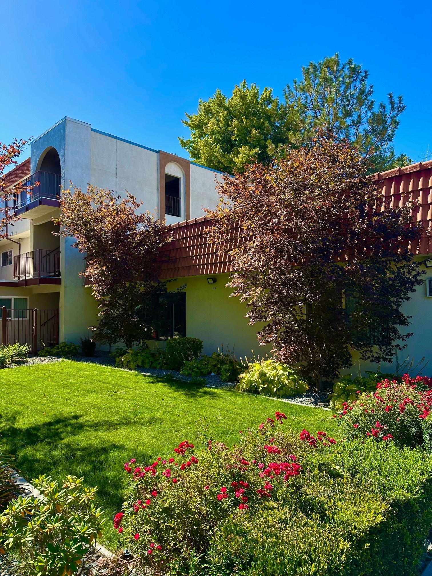 Peaceful garden-style apartment buildings at Sherwood Forest in Reno