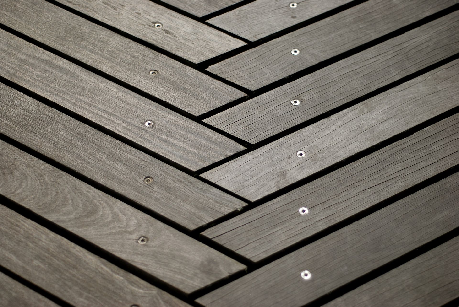 Interlocking weathered wood decking, built by a custom deck builder in West Chester, PA.