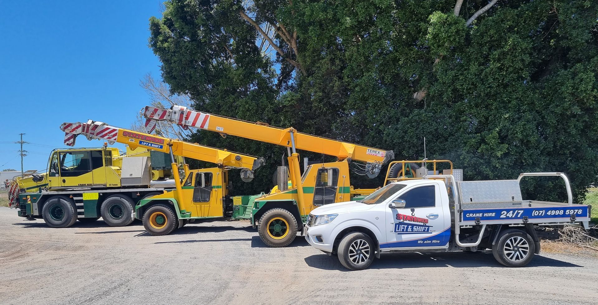 Yellow Mobile Crane on Construction Site — Statewide Lift & Shift Pty Ltd In Sarina, QLD