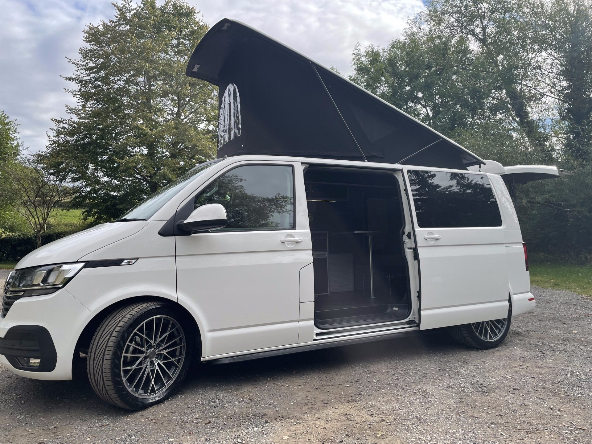 Stealth low profile pop top roof