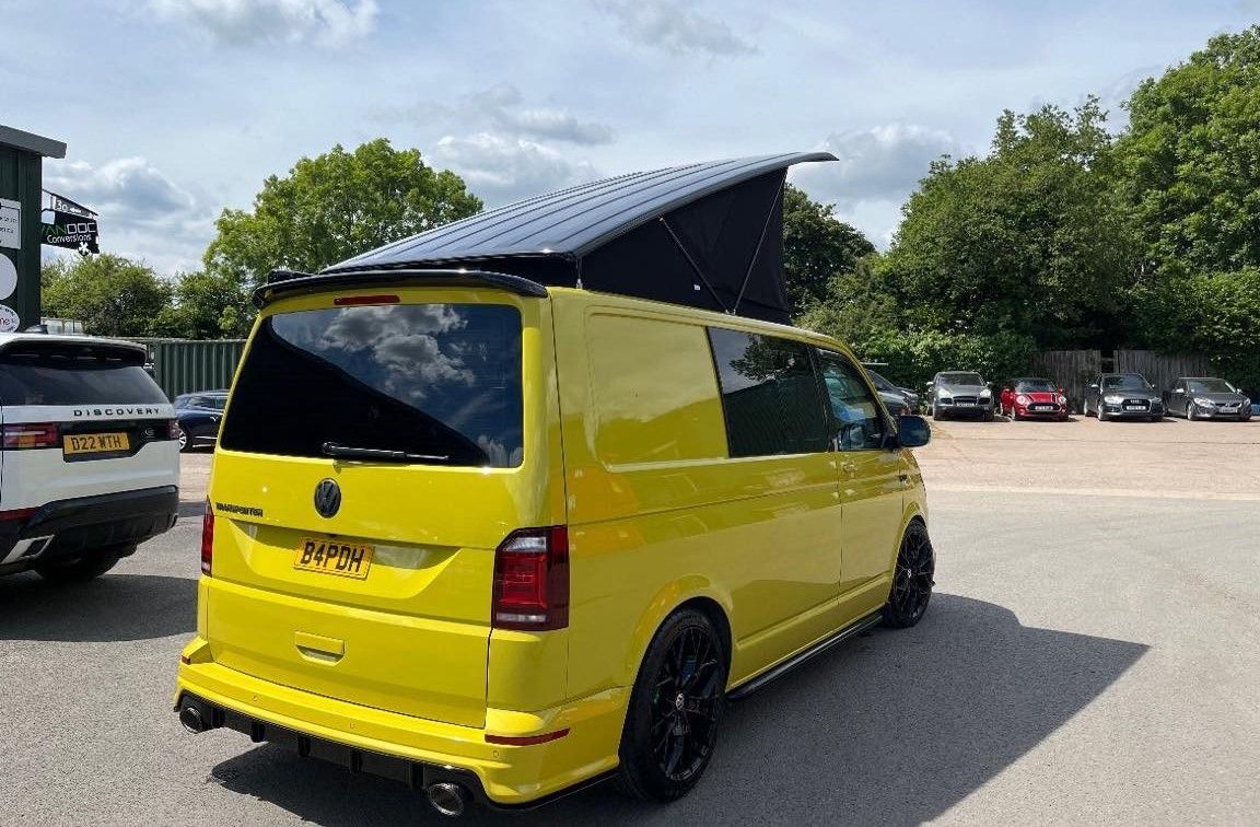 Stealth low profile pop top roof