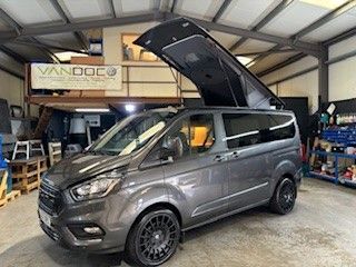Stealth low profile pop top roof on Ford Transit Custom