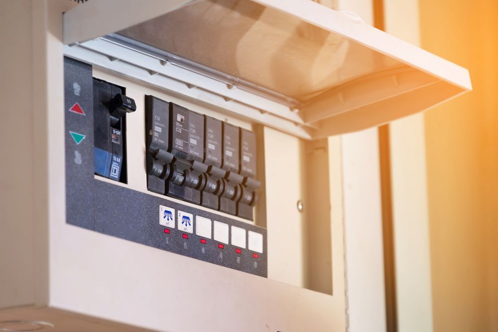 Open Electrical Panel With Circuit Breakers — White Rose Electrical in Coffs Harbour, NSW