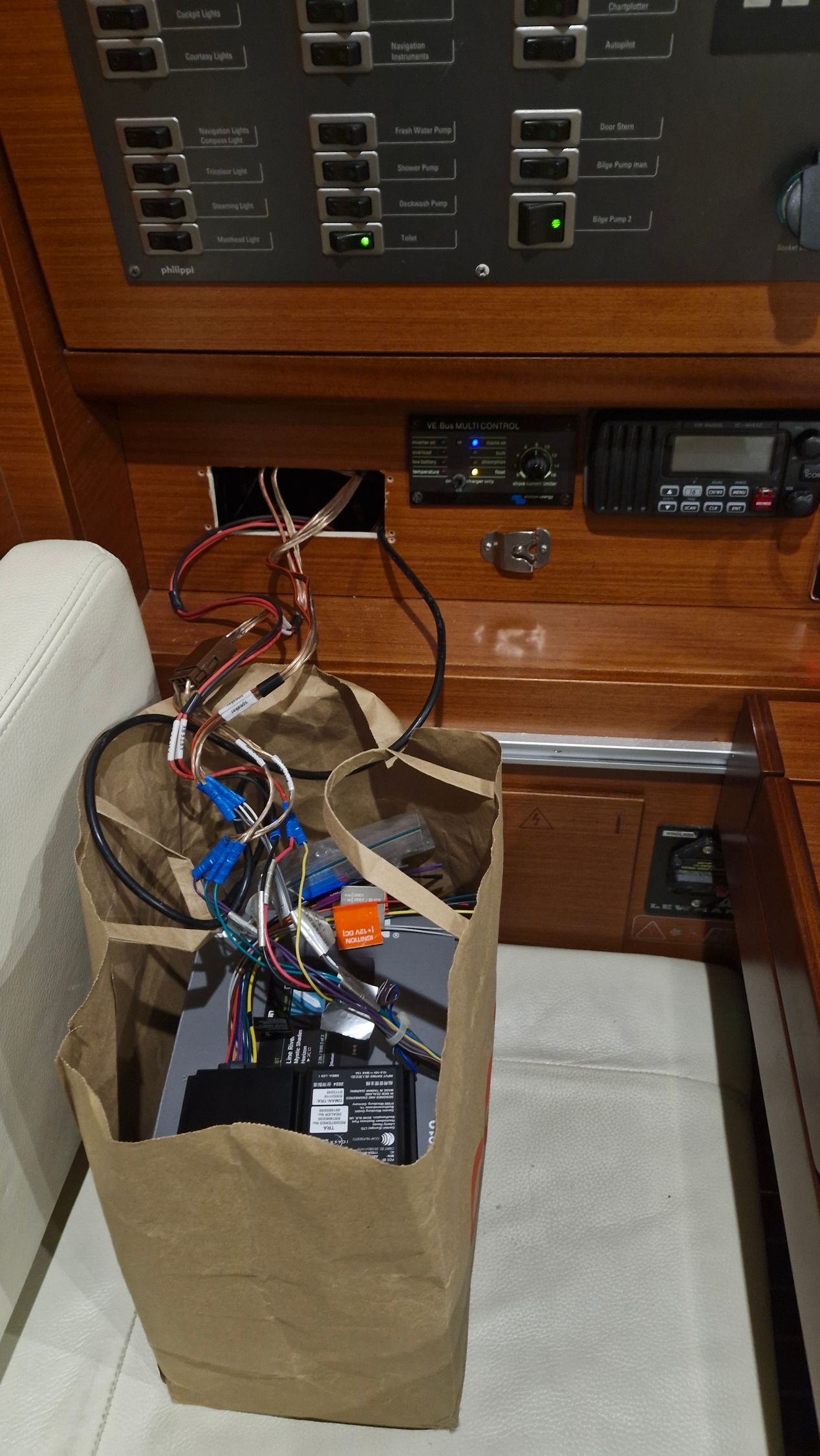 Brown Paper Bag Filled With Wires and Electronics — Symbiote Systems in Airlie Beach, QLD