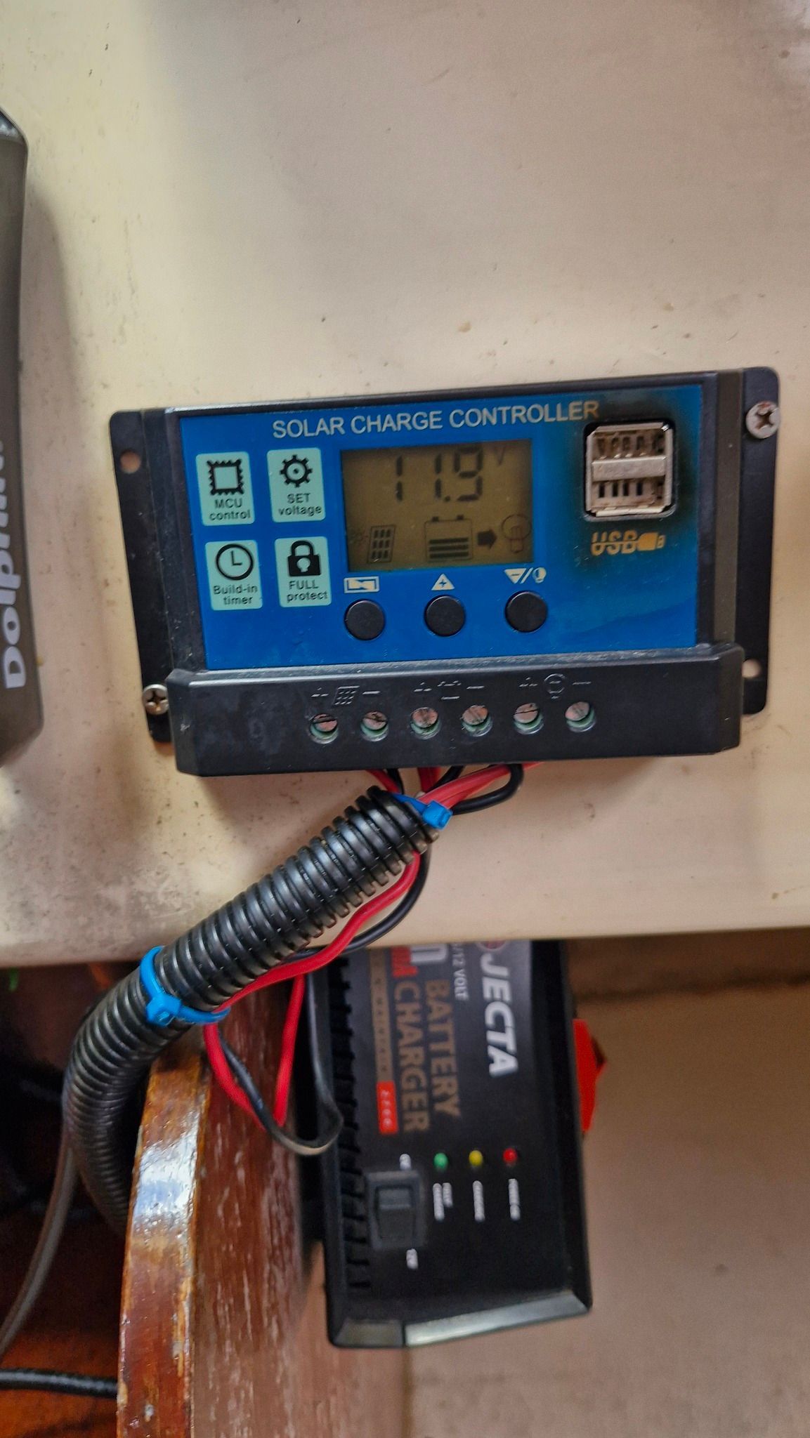 Solar Charge Controller With Display Showing 11.9 Volts — Symbiote Systems in Airlie Beach, QLD