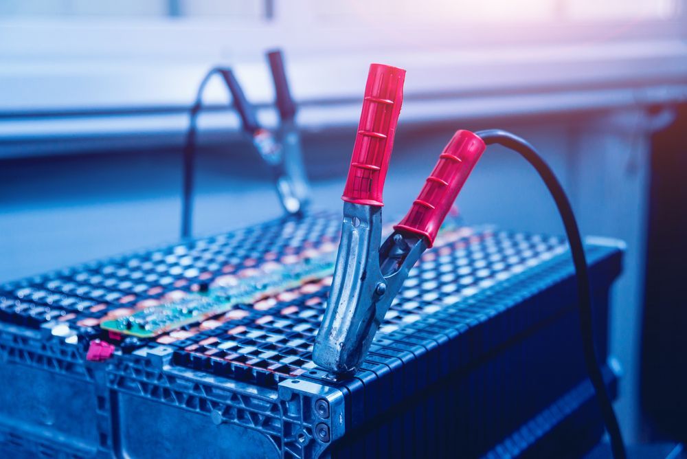 Jumper Cables Connected to an Automotive Battery Pack — Symbiote Systems in Proserpine, QLD