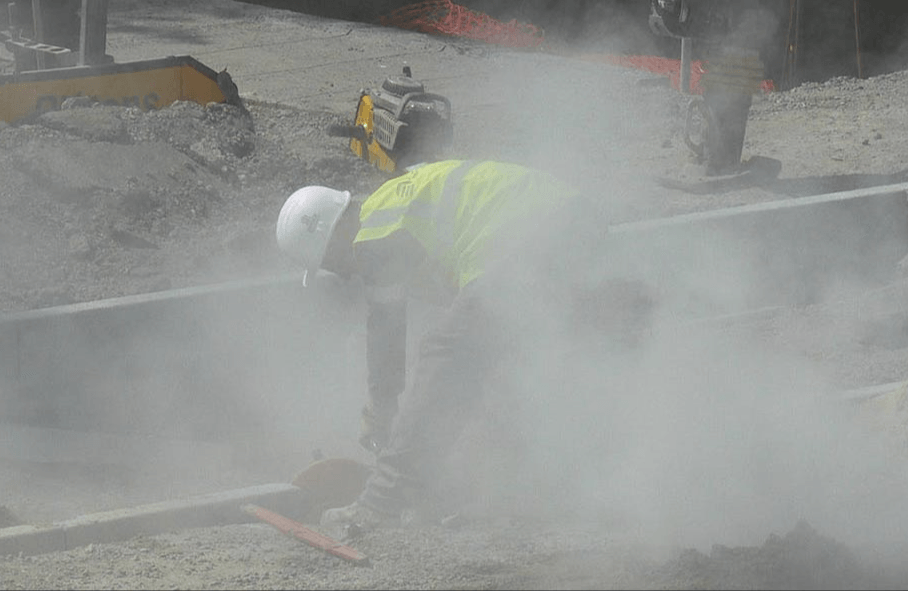 man working with types of hazardous dust