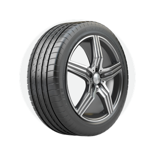 A close up of a tire on a wheel on a white background.