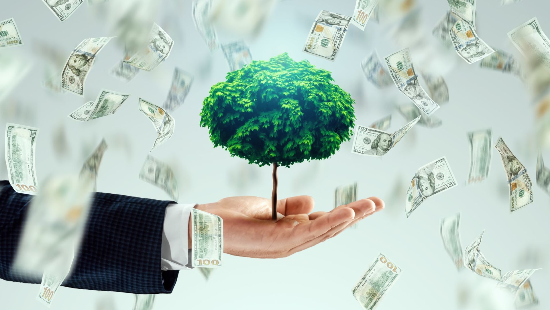 Hand in suit holding a green tree with US dollar bills raining down, symbolizing financial growth and prosperity.
