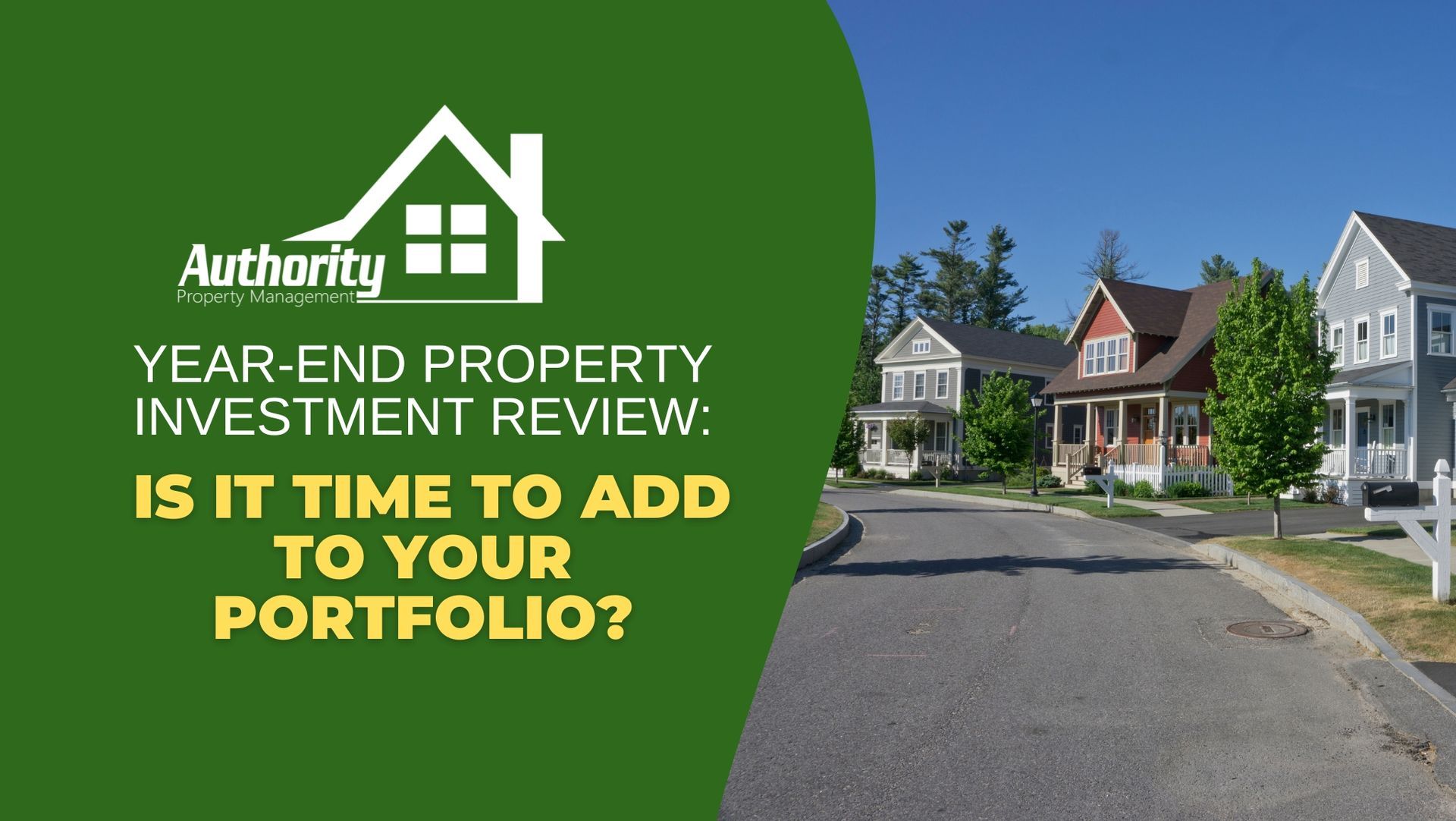 A man checking his laptop while smiling