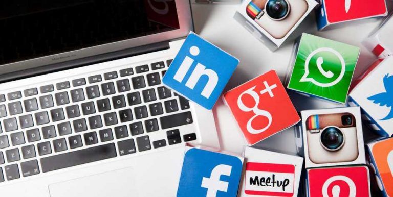 Social Media icons and laptop