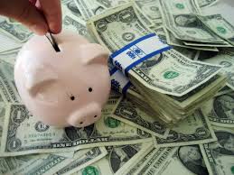 piggy bank and dollar bills
