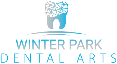 The logo for winter park dental arts has a tooth on it.