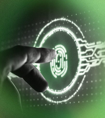 Finger touching a glowing fingerprint scanner on a green-tinted screen.