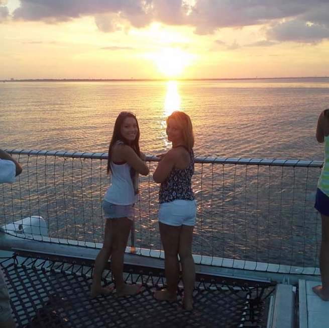 catamaran dolphin sunset adventure cruise