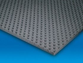 Foglio di schiuma grigia perforata con motivo a griglia su sfondo blu.