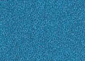 Primo piano di una spugna blu testurizzata.