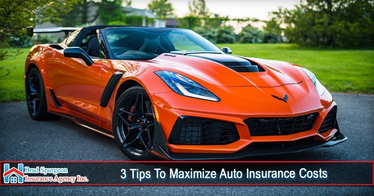 An orange Chevrolet Corvette sports car parked on a paved driveway