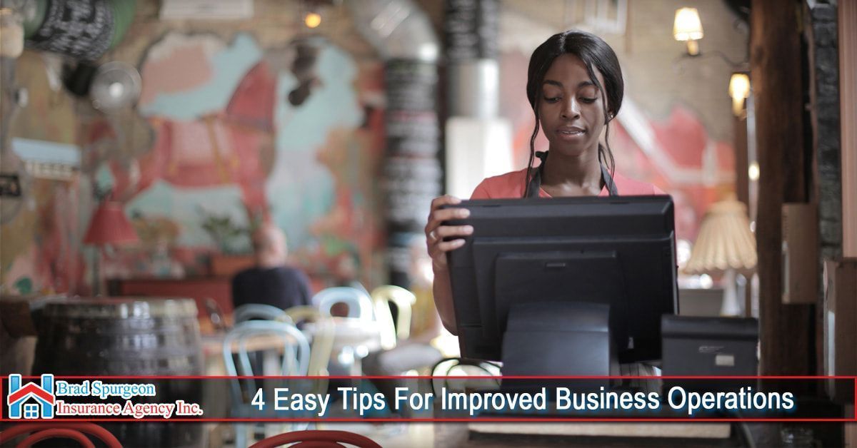 A person works at a POS system in a restaurant