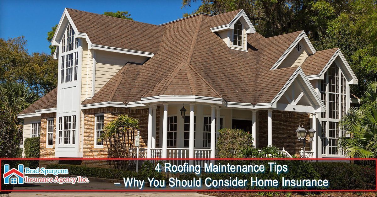 A two-story suburban home with a brown shingled roof