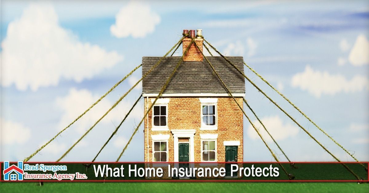 A house stands under a sky, protected by golden cables forming a canopy. 