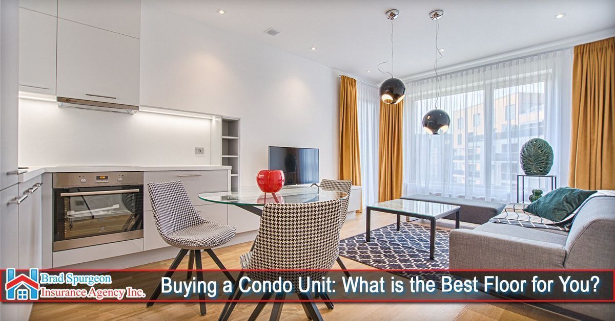 A modern open-concept condo living room and kitchen 