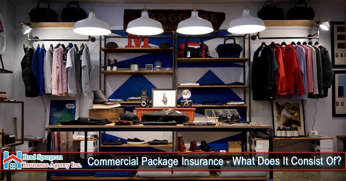 A retail clothing store interior with hanging apparel and shelves