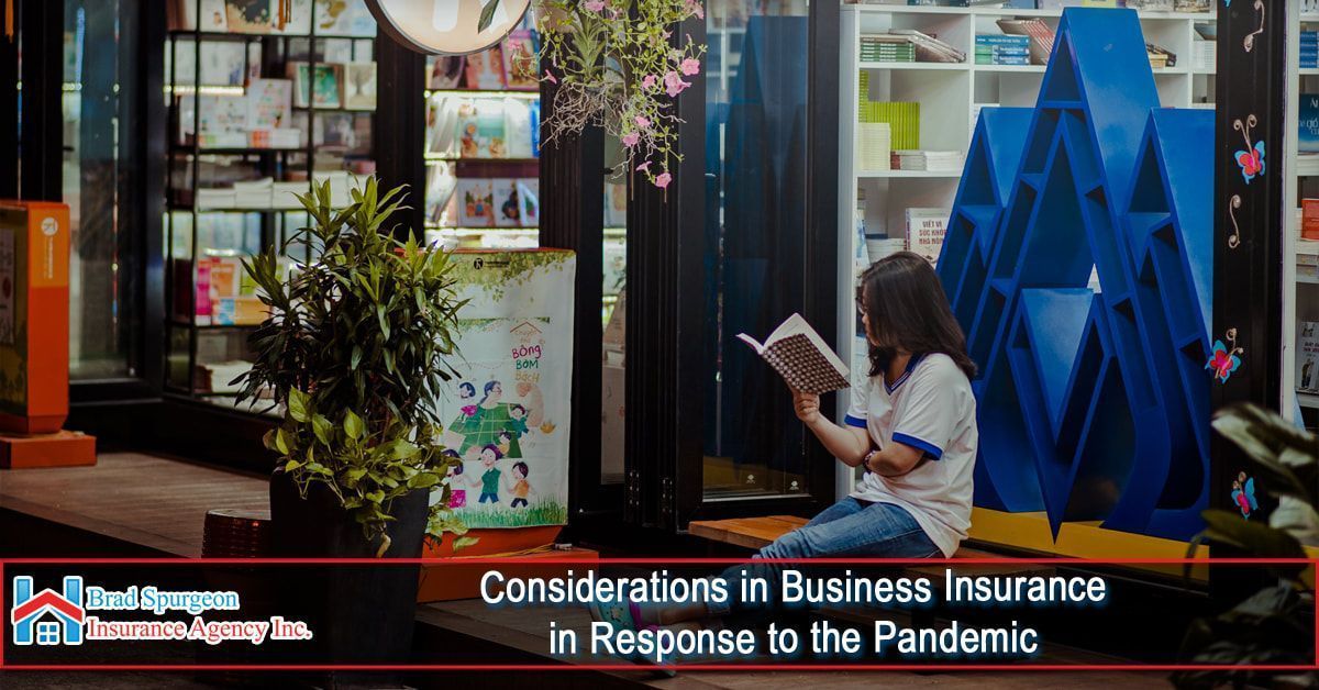 A person reads a book in a bookstore