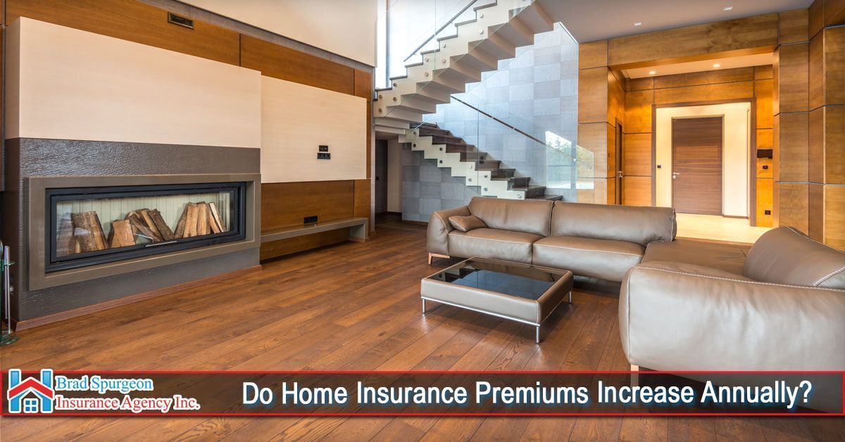 A modern living room with a fireplace and staircase