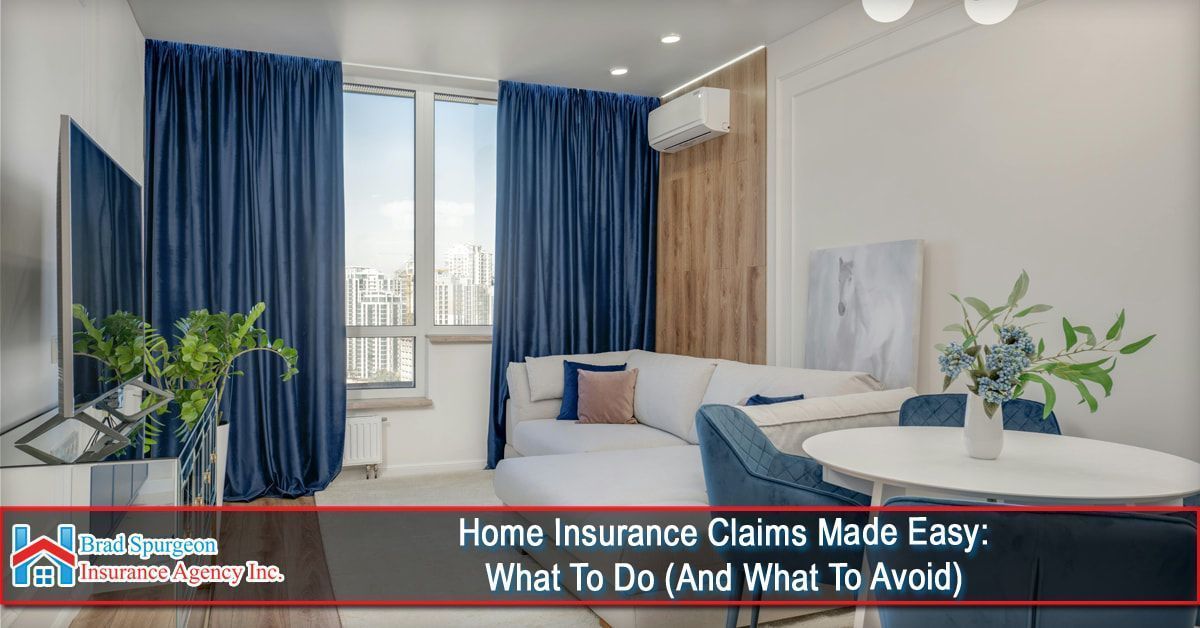 Modern living room with blue curtains and white sofa.