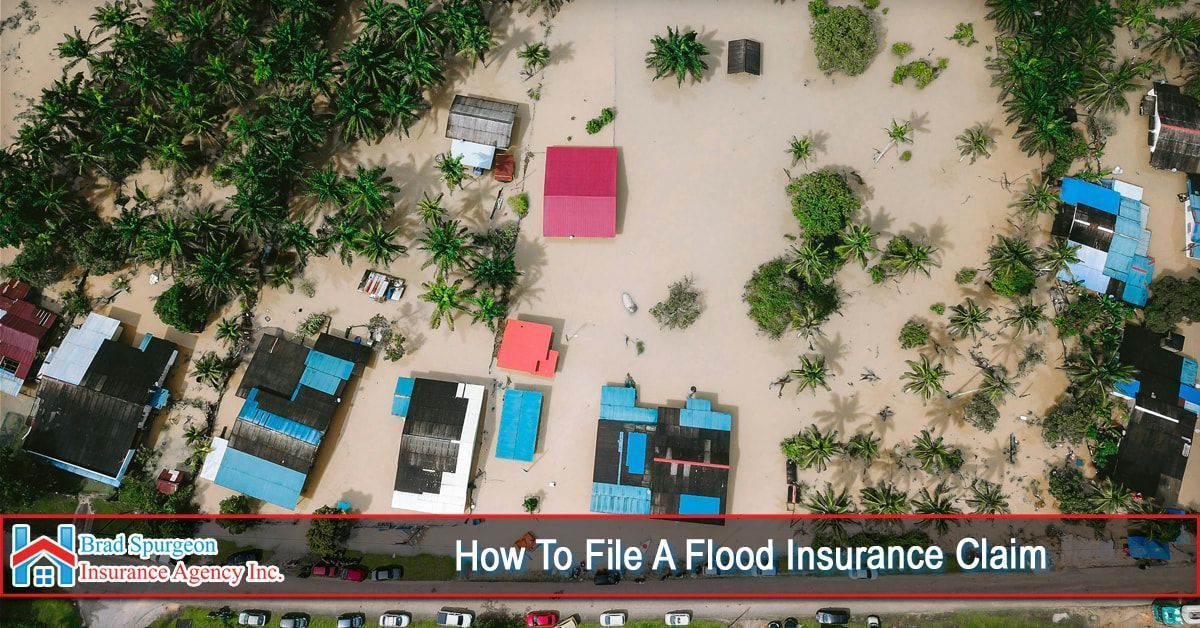 Aerial view of homes surrounded by floodwaters