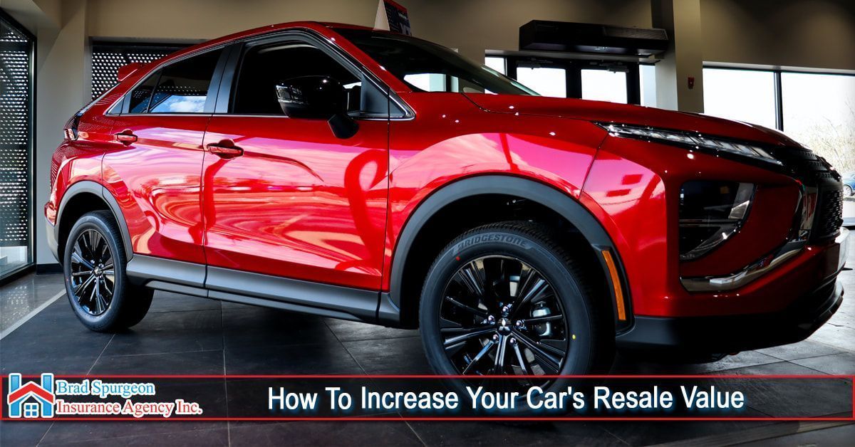 A vibrant red SUV on a showroom floor 