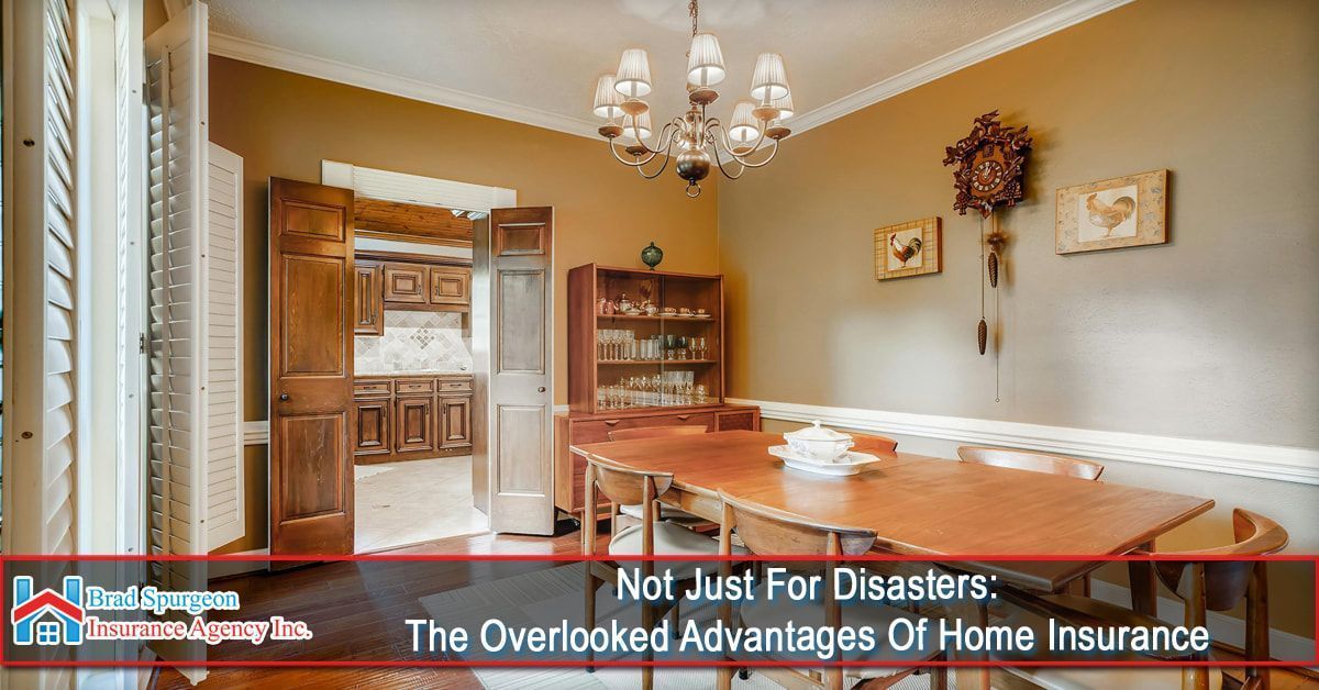 A formal dining room with a wooden table, chairs, chandelier, and hutch
