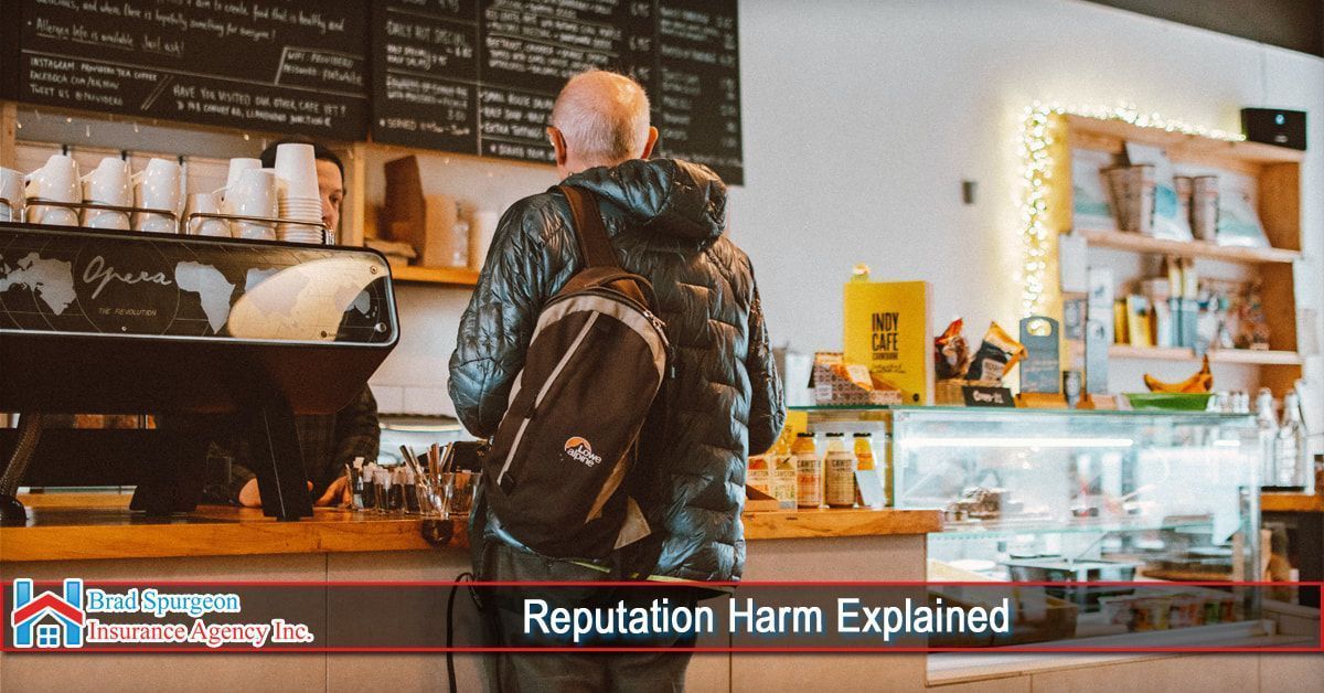A person wearing a backpack stands at a coffee shop counter in front of a menu board