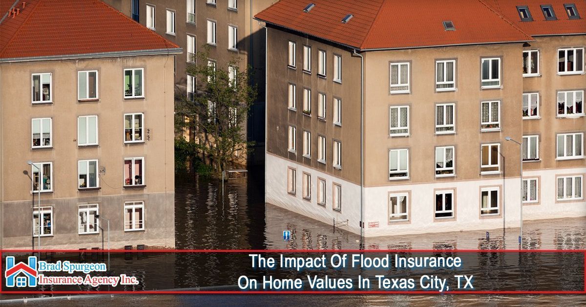 Floodwaters surround two multi-story apartment buildings