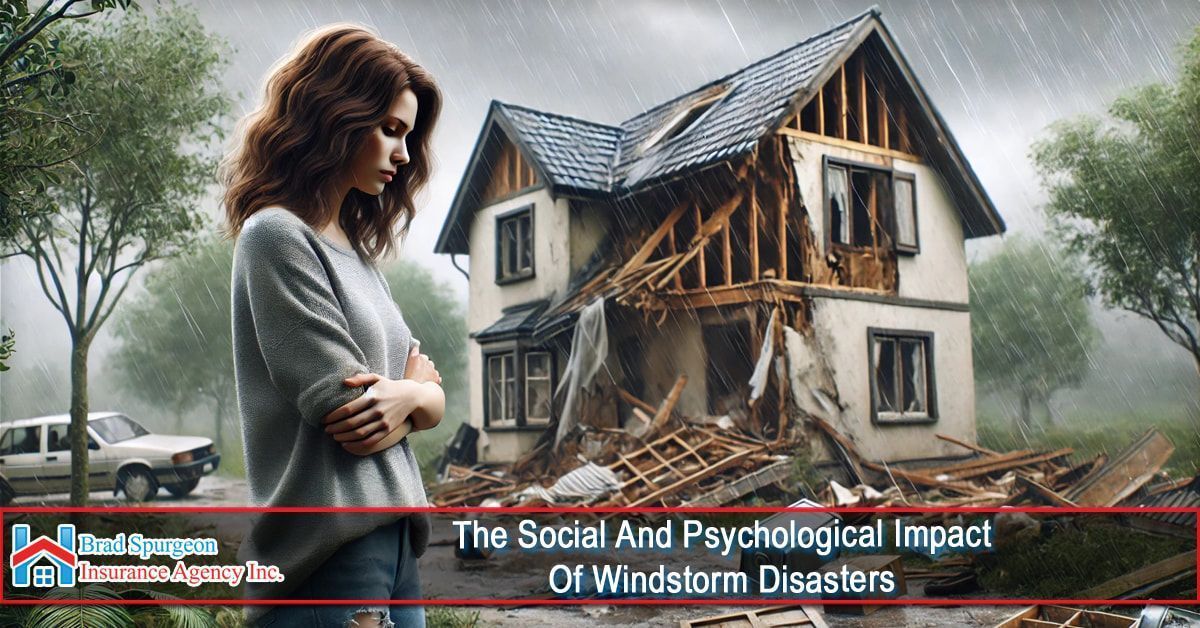 A person stands with arms crossed, looking at a house severely damaged by a storm