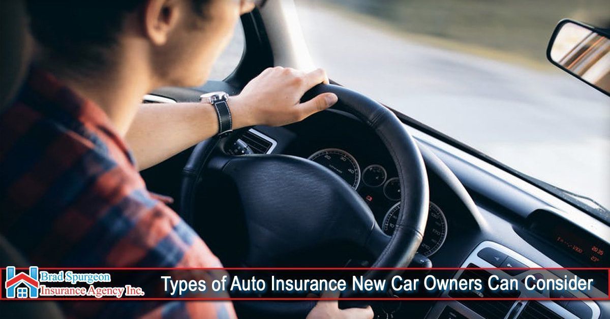 A driver’s hands on a car steering wheel