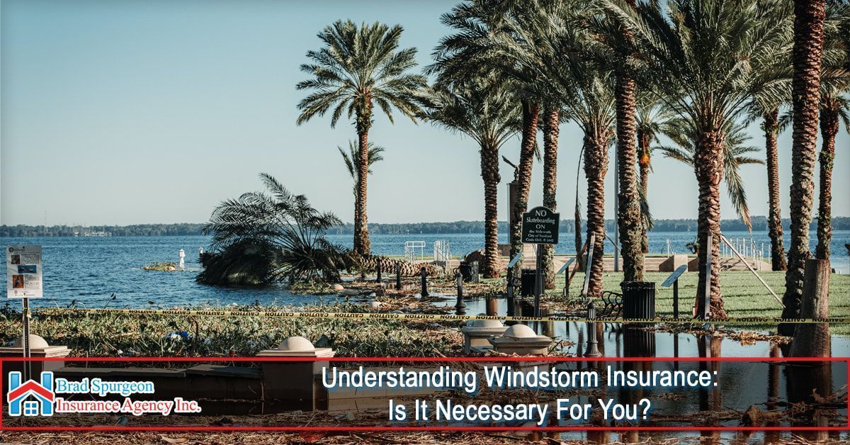 Palm trees line a flooded waterfront area under a clear sky