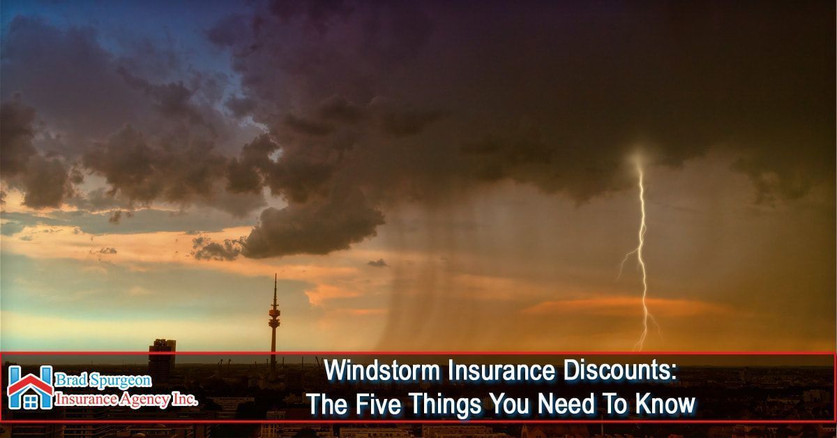 A lightning bolt strikes a dark, stormy sky above a city skyline