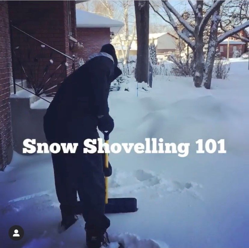 A man shoveling snow with the words snow shovelling 101 above him