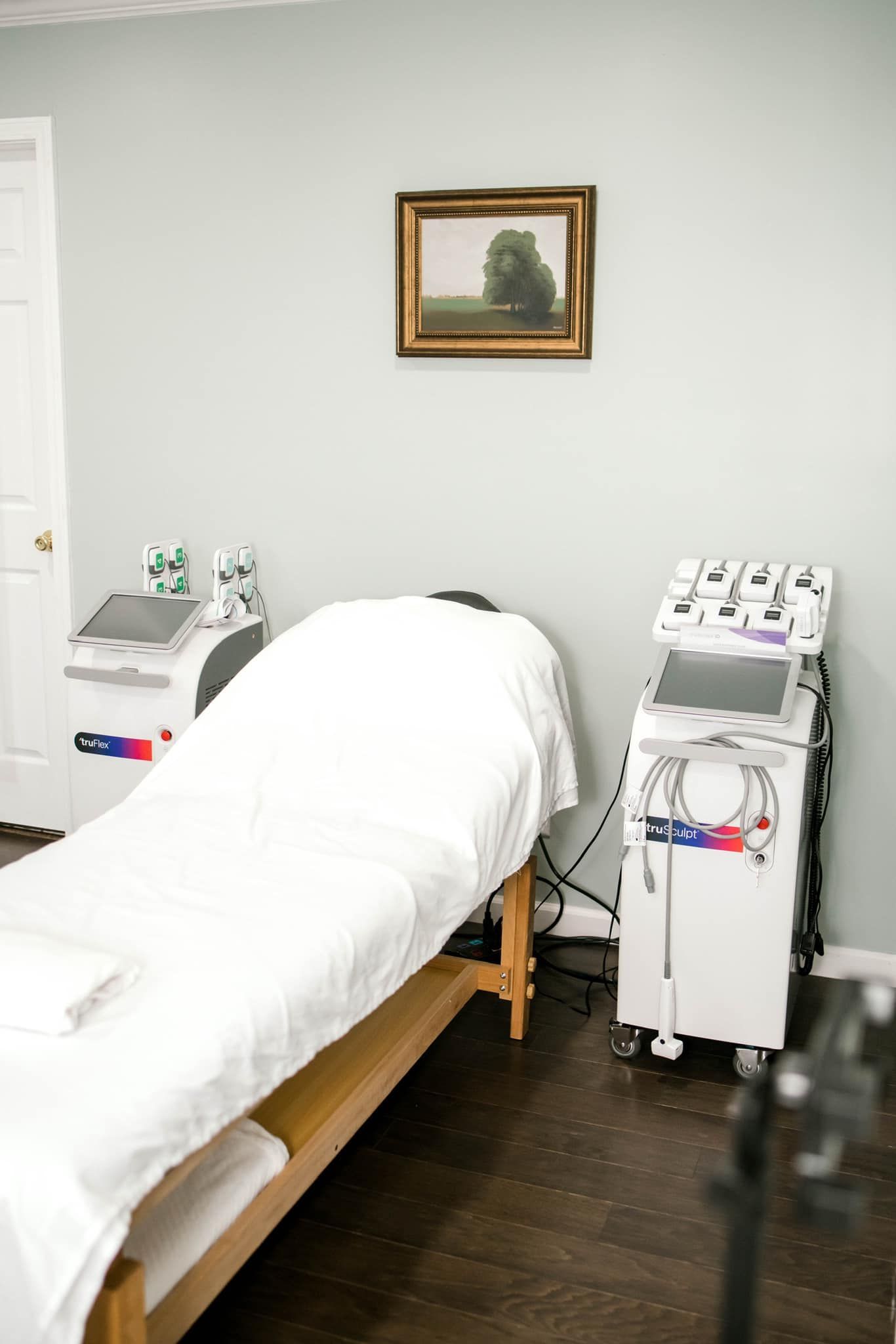A Room with A Bed, a Machine, and A Picture on The Wall — LaGrange, GA — LaGrange Body Lab