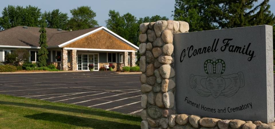 A sign for the connell family funeral home and crematory