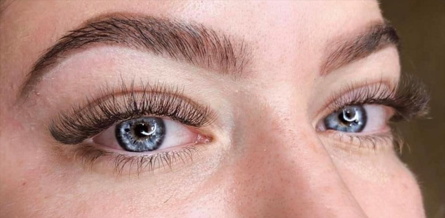A Close Up Of A Woman's Blue Eyes With Long Eyelashes — It's All About Brows In Varsity Lakes, QLD