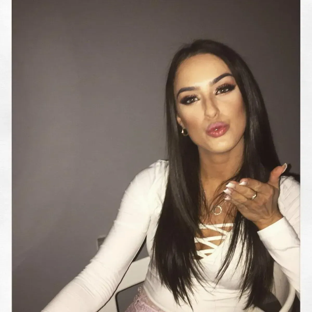 A Woman With Long Dark Hair Is Wearing A White Shirt — It's All About Brows In Varsity Lakes, QLD