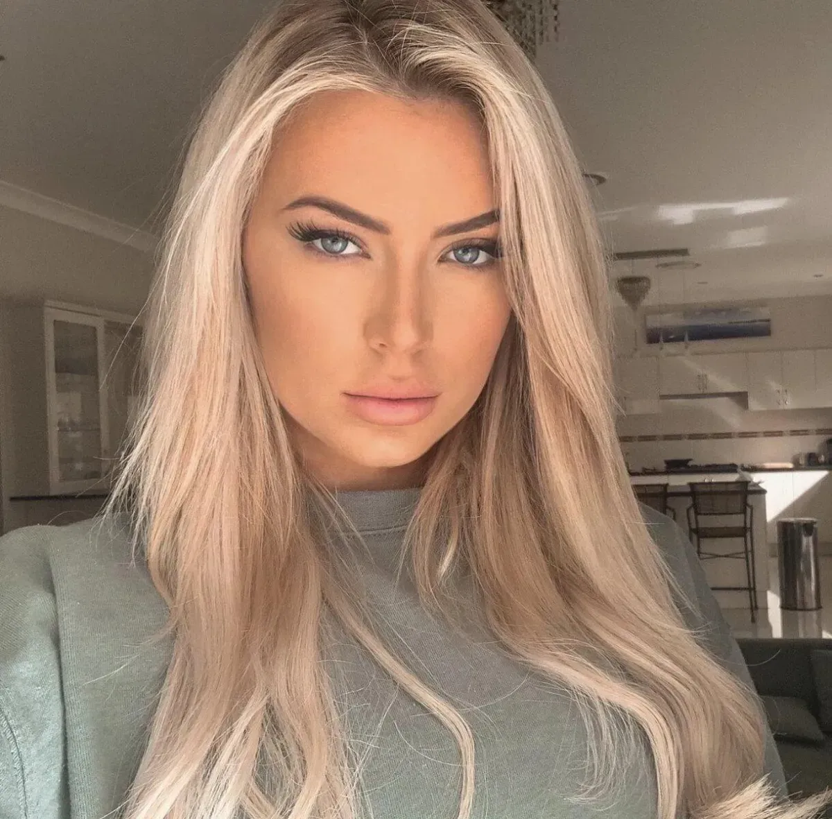 A Woman With Blonde Hair And Blue Eyes — It's All About Brows In Varsity Lakes, QLD